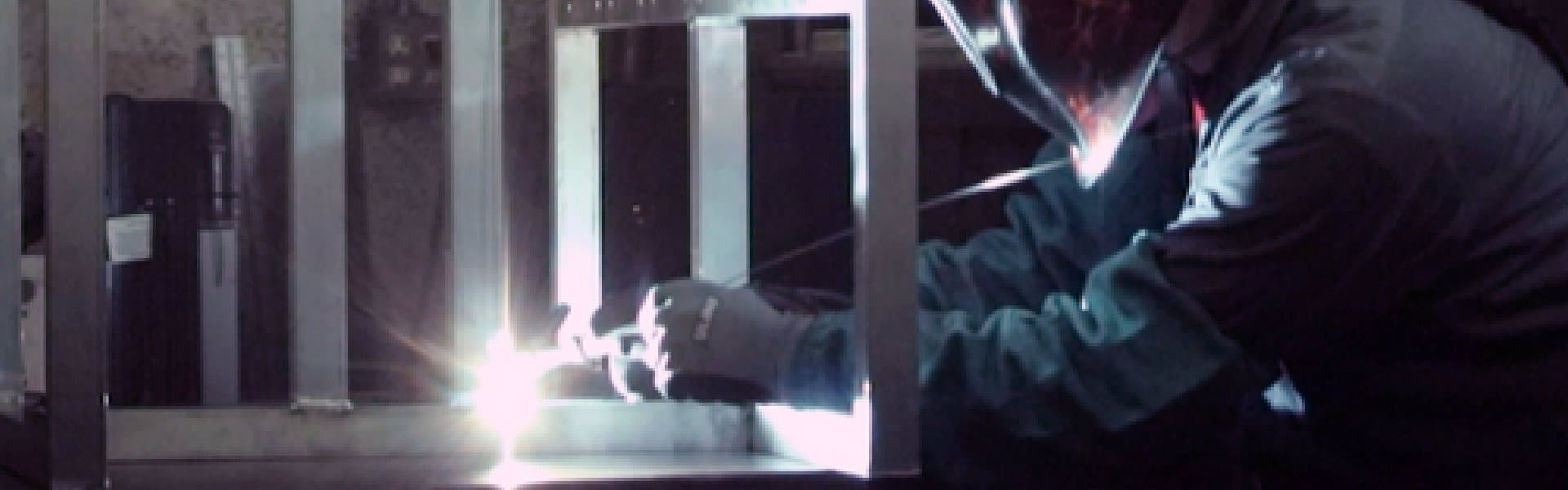 Welder joining a fabricated tube frame